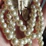 A beautiful faux pearl butterfly bracelet. Image 4