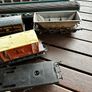 Some random parts for hornby trains. Included is 2 British rail coaches in need of repair. A Harry Potter coach. Also various goods trucks Image 3