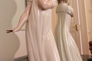 Nao by Lladro.  Yawning Girl. Damaged.