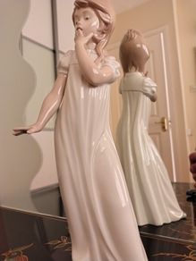 Nao by Lladro.  Yawning Girl. Damaged.