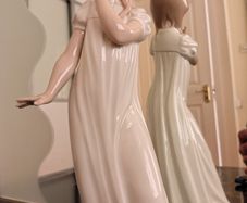 Nao by Lladro.  Yawning Girl. Damaged.