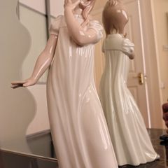 Nao by Lladro.  Yawning Girl. Damaged.