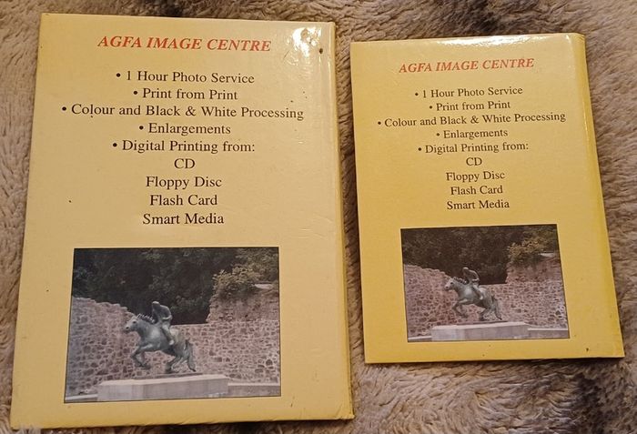 2 Photo albums fitting 24 photos each
