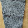Grey, feet printed trousers.  Age 9-10 Image 3
