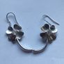 A pair of Sterling Silver earrings. Image 2