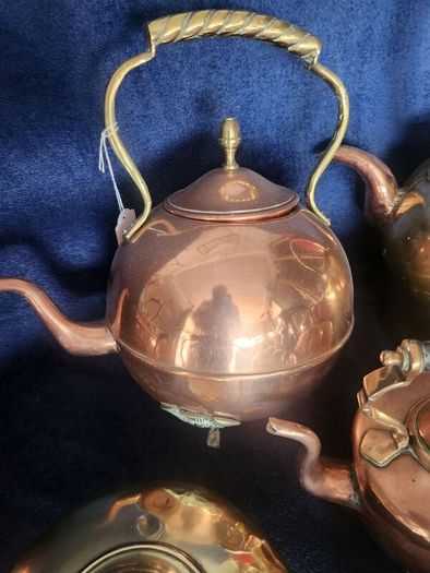 Vintage brass and cpper kettles. polished and beautiful.
