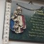 A vintage green marble wall plaque with a metal sculpture of the Holy Family. Image 2