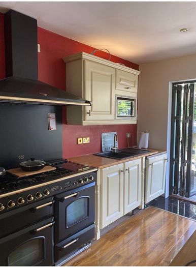Kitchen + Island + Solid Oak Countertops + Integrated Dishwasher + black sink & gold mixer tap