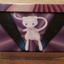 Pokemon Tin and 60 Pokemon cards Image 4