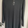 NAF NAF fine knit jumper dress in a rich dark green shade. Image 2