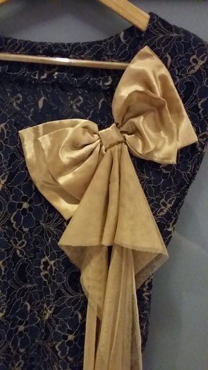 Brand New. Navy and gold lace dress