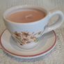 Miniature vintage teacup and saucer with candle Image 3