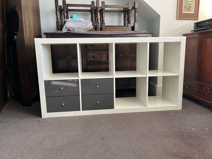 IKEA Kallax shelving unit - white with 4 grey drawers