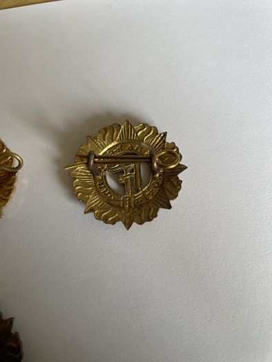 Irish Army cap badges three brass one staybrite