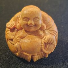Carved wooden  Buddha.
