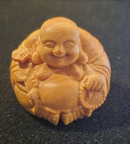 Carved wooden  Buddha.