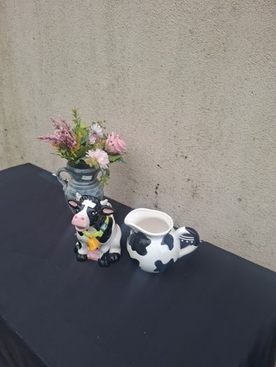 By post only 2 ceramic cow pitchers