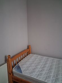 single pine bed and mattress