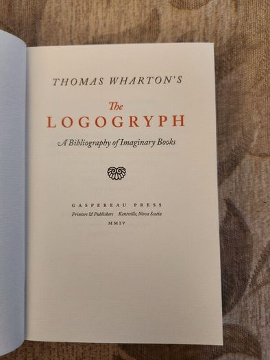 The Logogryph. By Thomas Wharton. First Edition Complete With Presentation Sleeve Paperback In Very Good Condition. 37