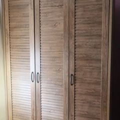 JYSK MANDERUP 3-door wardrobe in a wild oak finish, featuring slatted-style louvered doors.