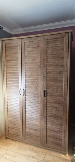 JYSK MANDERUP 3-door wardrobe in a wild oak finish, featuring slatted-style louvered doors.
