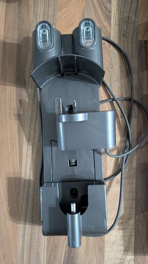 Dyson V6 handheld vacuum cleaner with charger and accessories