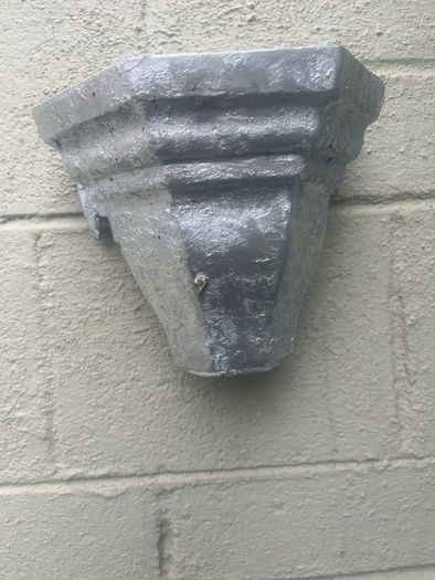 3 water hoppers converted to plant holders. With drainage