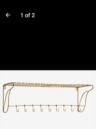 Danish interior design brass shelf with hooks