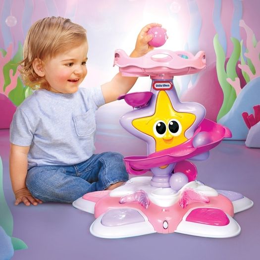 Girls toy activity table and ball tower.