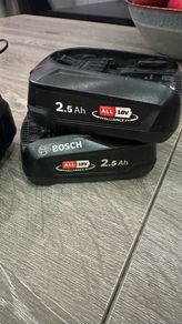 2 Bosch 18V 2.5 Ah Batteries with Charger.