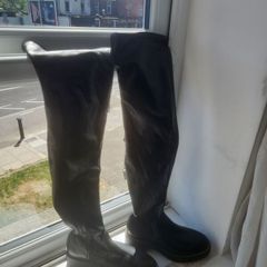 Over the knee black boots never used tried on in house.