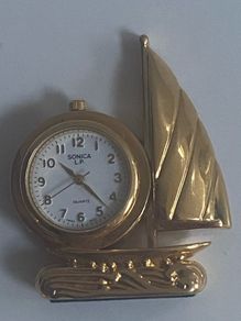 Miniature  vintage Sonica metal nautical clocks
