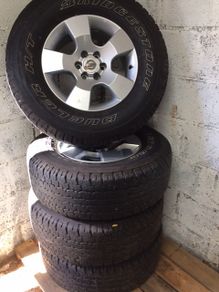 Set of 4 Nissan 16-inch alloy wheels with 265/70R16 tyres