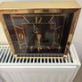 Gold clock with black face Image 5