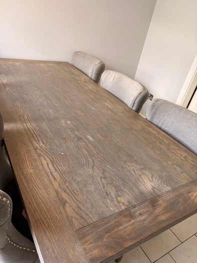 Solid wood table with dining chairs