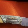 lock knife wolfhead decorative and bone handle Image 3