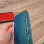 Red Nintendo 3DS xl and Aqua Blue Nintendo 3DS Image 6