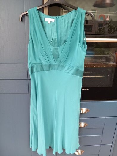 Turquoise knee length silk dress