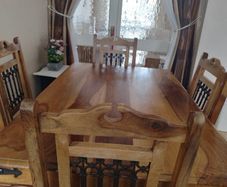 Solid oak and pine and wrought iron kitchen table and chairs over 25 years old advertised for mother in law so can be only viewed in Ballybrack south Co. Dublin
