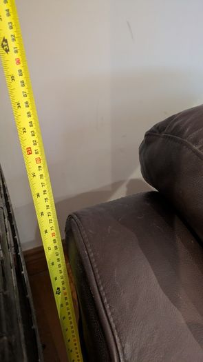 Dark brown leather armchair