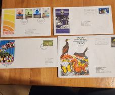 4 FIRST DAY COVERS. See photos.  In good condition.
