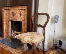 Antique French polished oak chair