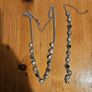 This matching silver-tone crystal necklace and bracelet set features alternating clear and black round stations with textured bezels.  SEE PHOTOS FOR SAME. Image 10