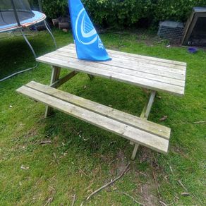 large garden bench and table