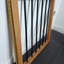 Oak and black metal stair gate Image 4