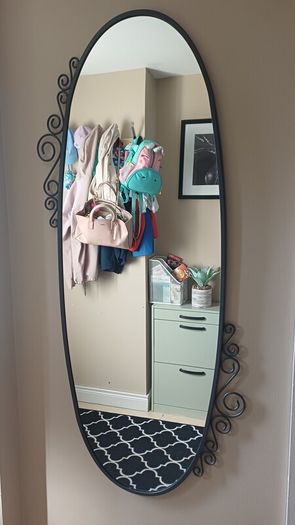black iron mirrors and table