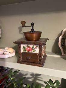 Vintage hand-crank coffee grinder
