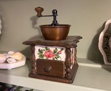 Vintage hand-crank coffee grinder
