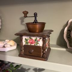 Vintage hand-crank coffee grinder