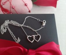 New silver pendant with real diamonds